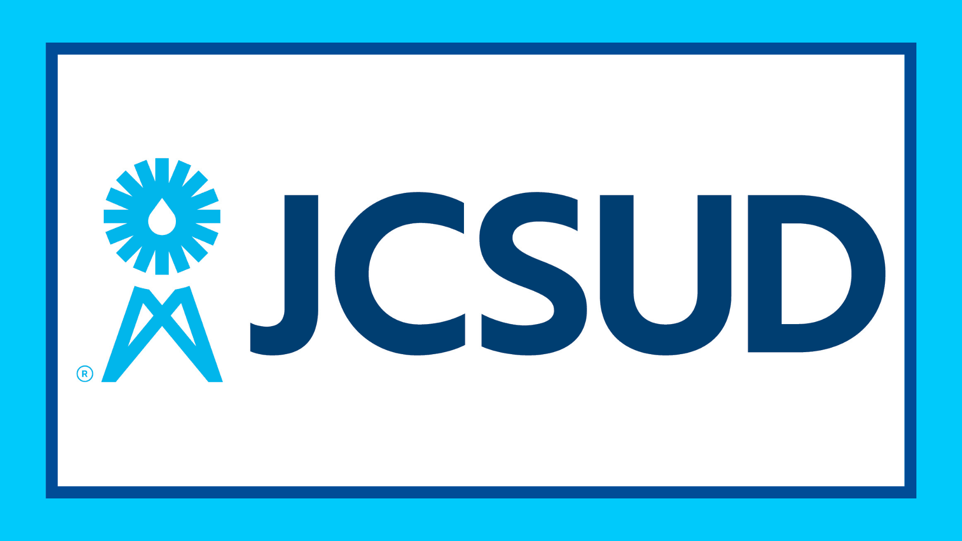 The JCSUD logo with a blue border around it